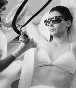 woman receiving laser hair removal on underarm